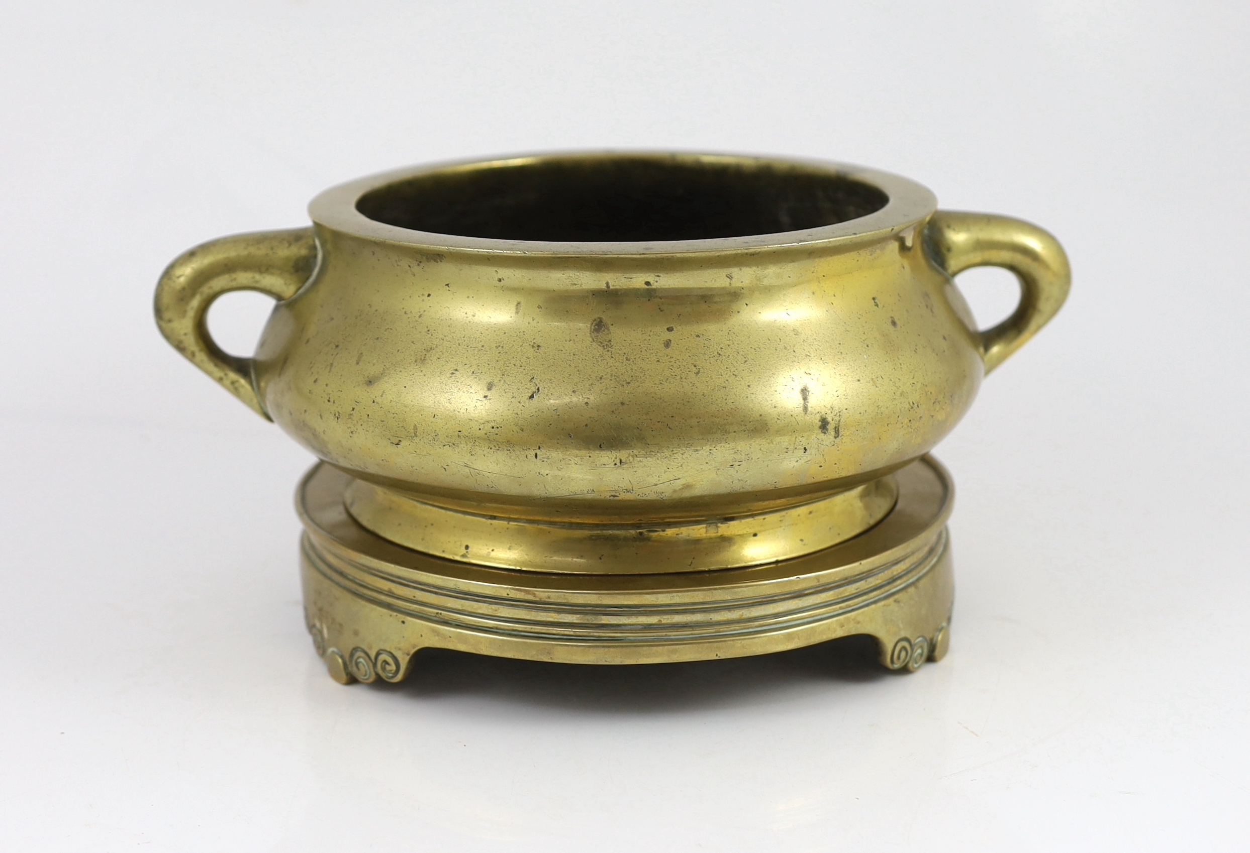 A large Chinese polished bronze censer and stand, gui, Xuande mark, 18th century